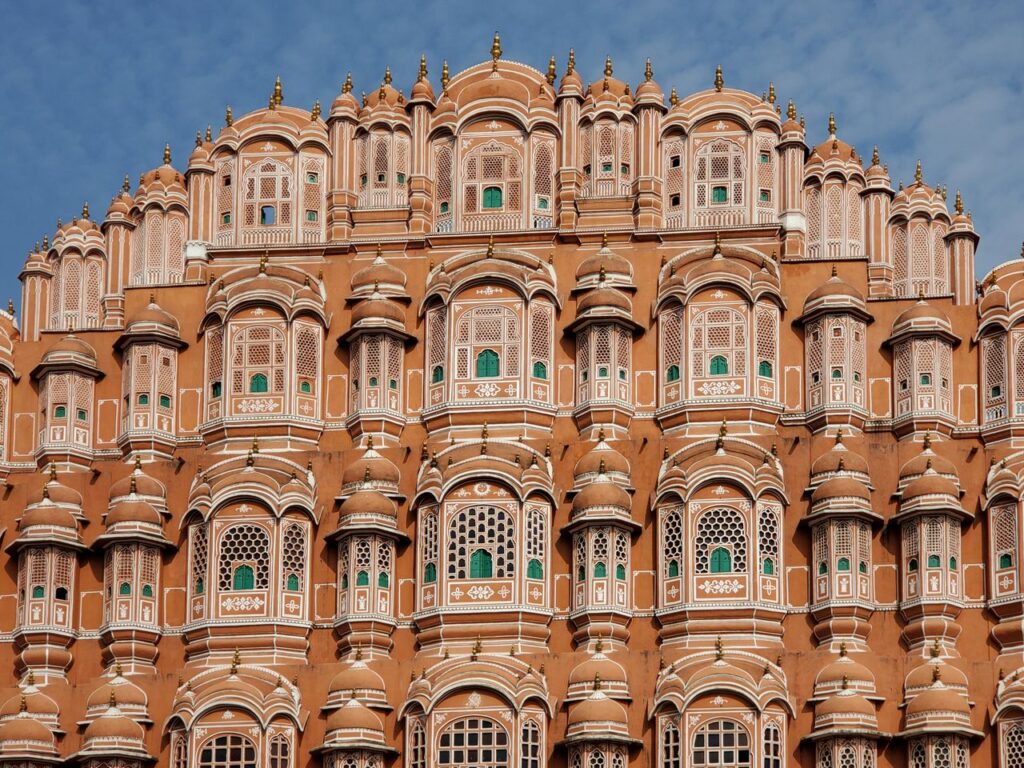 Stunning view of Hawa Mahal's intricate facade in Jaipur, showcasing Mughal architecture.